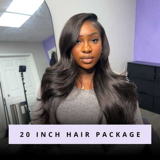 Woman with long hair styled in a 20 inch hair package, indoors.